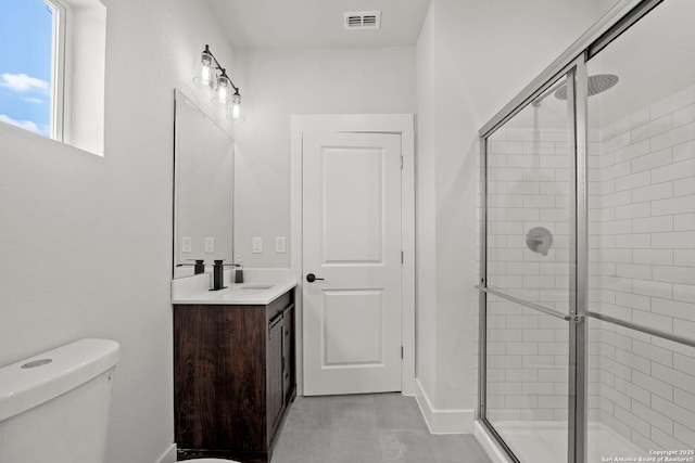 10706 Pharaoh Run, San Antonio, TX 78254 - bathroom with a shower stall, vanity, and tile patterned flooring