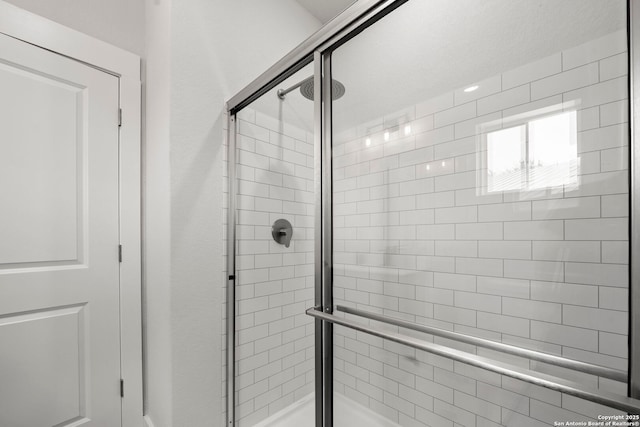 10706 Pharaoh Run, San Antonio, TX 78254 - bathroom featuring a stall shower