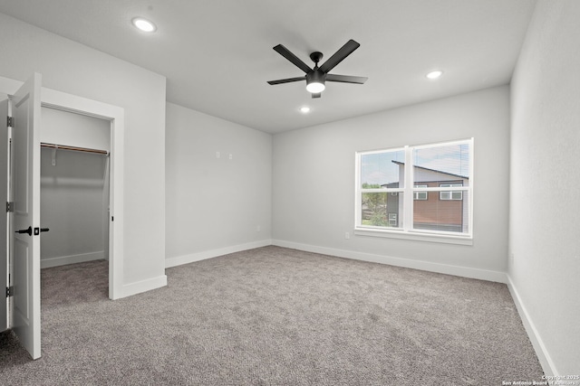 10706 Pharaoh Run, San Antonio, TX 78254 - unfurnished bedroom featuring carpet floors, recessed lighting, a spacious closet, a ceiling fan, and a closet