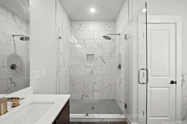 10706 Pharaoh Run, San Antonio, TX 78254 - bathroom featuring a shower stall, vanity, and recessed lighting