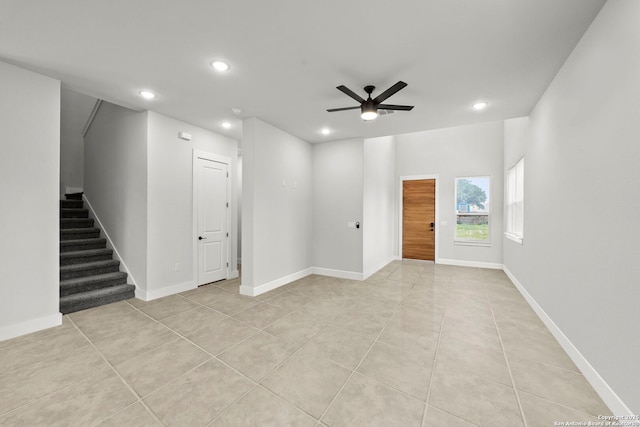 10706 Pharaoh Run, San Antonio, TX 78254 - unfurnished living room with recessed lighting, ceiling fan, stairs, and light tile patterned floors