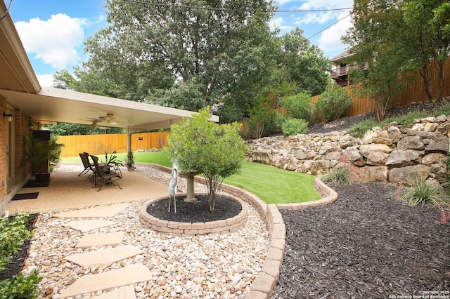 14630 Snip, San Antonio, TX 78248 - fenced backyard with a patio area
