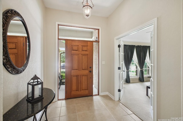 14630 Snip, San Antonio, TX 78248 - entrance foyer featuring light tile patterned floors and light colored carpet