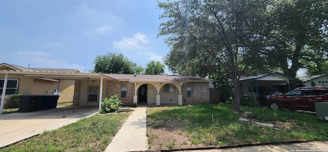 1826 Laven Dr, San Antonio, TX 78228 - single story home featuring driveway, a carport, and brick siding