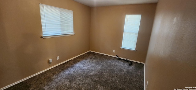 1826 Laven Dr, San Antonio, TX 78228 - unfurnished room with dark colored carpet and baseboards
