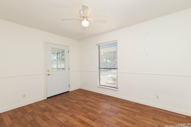 540 Soft Wind, Canyon Lake, TX 78133 - unfurnished room with healthy amount of natural light, wood finished floors, and a ceiling fan