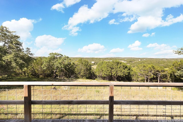 540 Soft Wind, Canyon Lake, TX 78133 - view of yard with a forest view