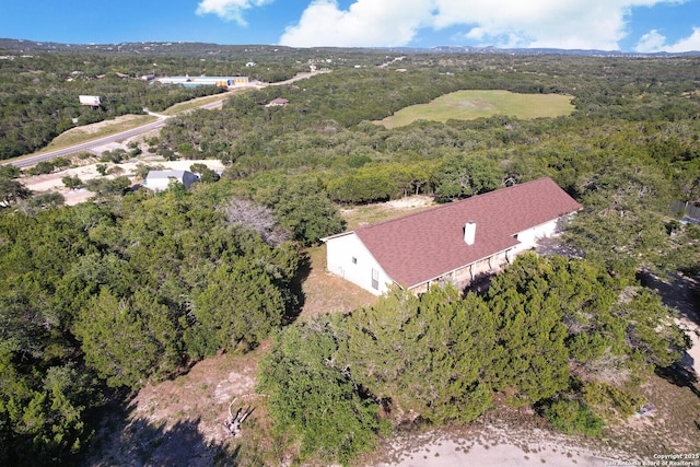 540 Soft Wind, Canyon Lake, TX 78133 - aerial view of property and surrounding area with a forest