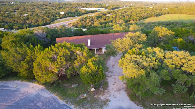 540 Soft Wind, Canyon Lake, TX 78133 - aerial view of property and surrounding area featuring a forest