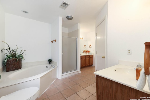 540 Soft Wind, Canyon Lake, TX 78133 - full bath featuring vanity, a stall shower, a bath, and tile patterned floors