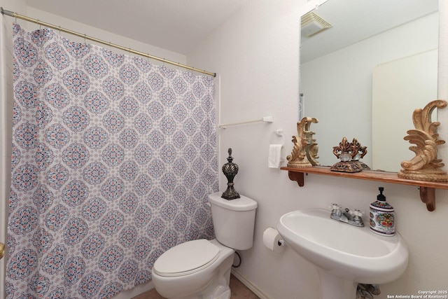 540 Soft Wind, Canyon Lake, TX 78133 - bathroom with toilet and a shower with curtain