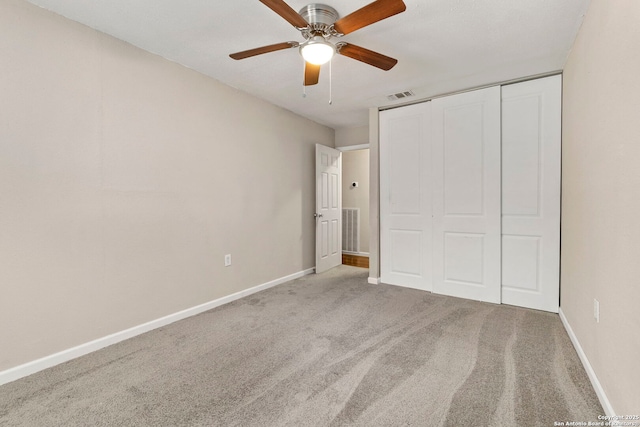 5811 Lake Chap, San Antonio, TX 78222 - unfurnished bedroom featuring carpet, a closet, and a ceiling fan