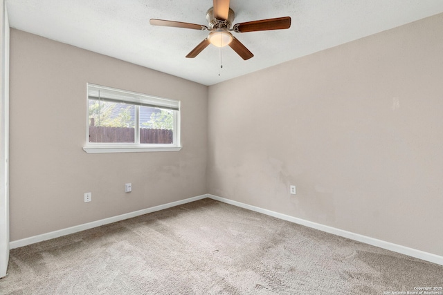 5811 Lake Chap, San Antonio, TX 78222 - carpeted spare room featuring baseboards and a ceiling fan