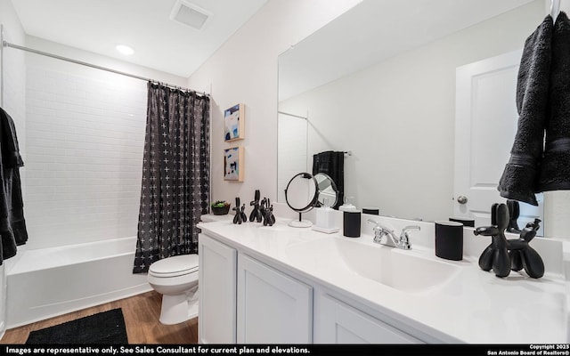 4948 Hawkwell Ln, San Antonio, TX 77584 - full bathroom featuring wood finished floors, vanity, and shower / bath combination with curtain