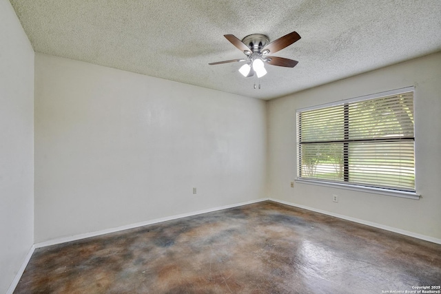 105 Apache, Cibolo, TX 78108 - unfurnished room featuring finished concrete flooring, a textured ceiling, and ceiling fan