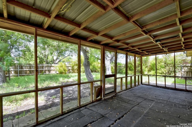 105 Apache, Cibolo, TX 78108 - unfurnished sunroom with view of wooded area