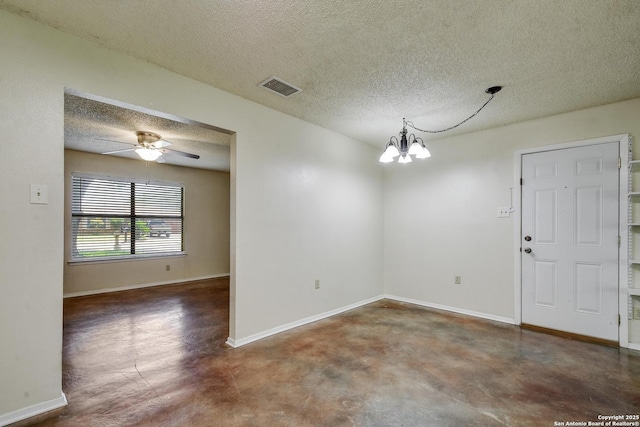 105 Apache, Cibolo, TX 78108 - empty room with a textured ceiling, finished concrete floors, a chandelier, and a ceiling fan