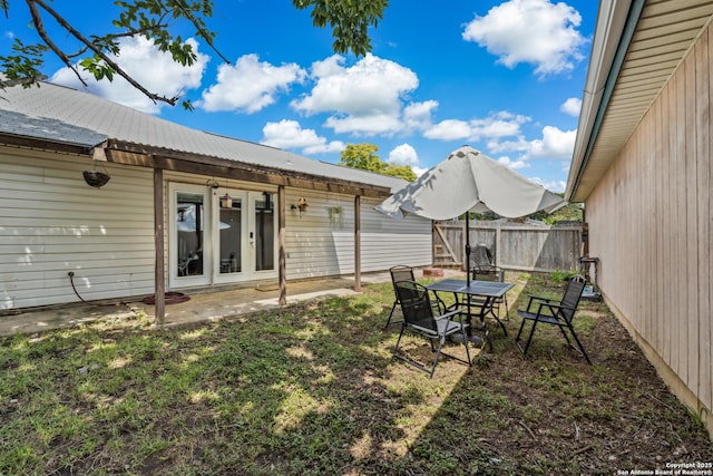 7643 Heathridge, San Antonio, TX 78250 - view of yard with a patio area and french doors
