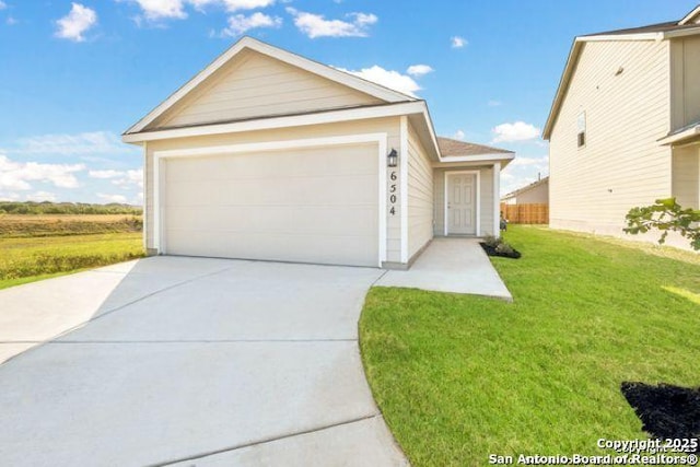13635 Aston Mnr, San Antonio, TX 78253 - single story home with driveway, a front lawn, and a garage