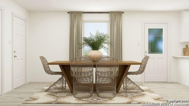 13635 Aston Mnr, San Antonio, TX 78253 - dining area with light wood-style flooring and baseboards
