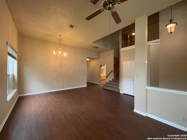 5103 Cabin Lake Dr, San Antonio, TX 78244 - spare room featuring ceiling fan, dark wood-style floors, stairway, and a chandelier