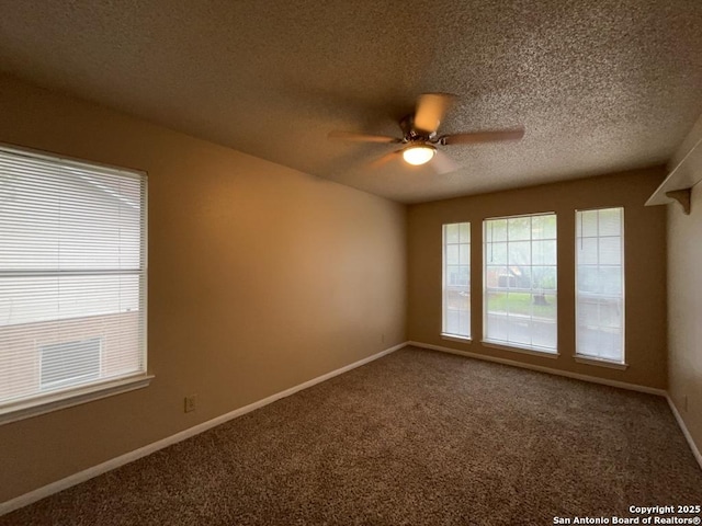 5103 Cabin Lake Dr, San Antonio, TX 78244 - empty room with a ceiling fan, carpet floors, and a textured ceiling