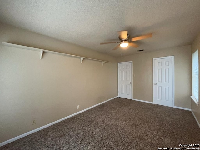 5103 Cabin Lake Dr, San Antonio, TX 78244 - unfurnished bedroom with dark colored carpet, a textured ceiling, and ceiling fan