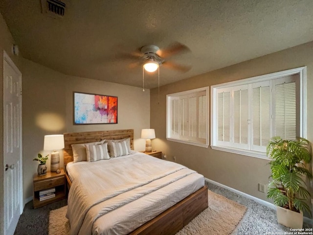 5103 Cabin Lake Dr, San Antonio, TX 78244 - carpeted bedroom featuring baseboards and a ceiling fan
