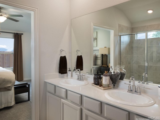 29519 Frontier Way, San Antonio, TX 78260 - ensuite bathroom featuring double vanity, a ceiling fan, a shower stall, and vaulted ceiling