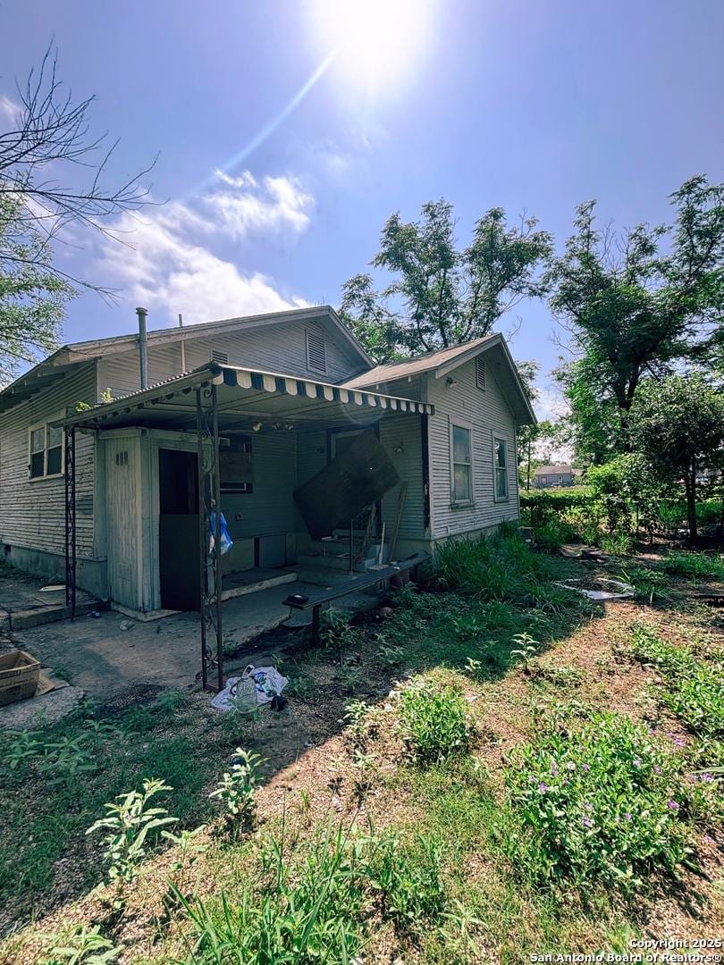 448 Furnish, San Antonio, TX 78204 - back of property with an attached carport and a porch