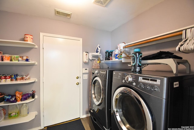 10310 Mission Crk, Converse, TX 78109 - laundry area featuring washer and dryer and wood finished floors