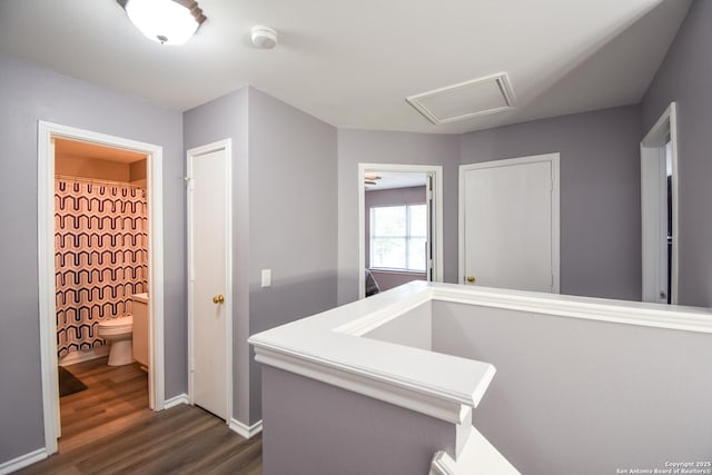 10310 Mission Crk, Converse, TX 78109 - hall featuring dark wood-type flooring and baseboards