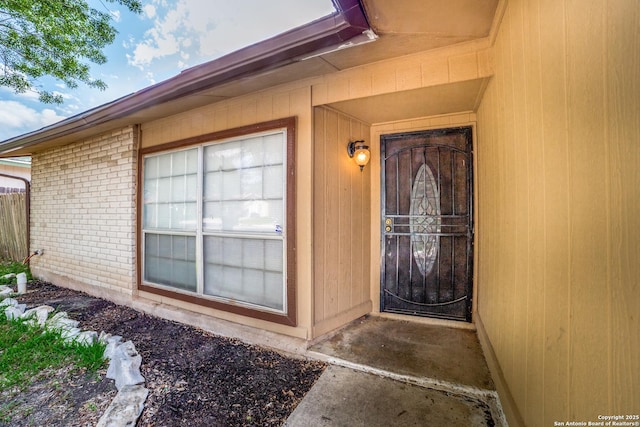 1034 Lemon Tree, San Antonio, TX 78245 - doorway to property featuring brick siding