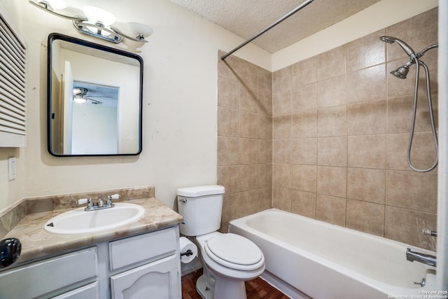 1034 Lemon Tree, San Antonio, TX 78245 - full bath featuring vanity, shower / bathtub combination, a textured ceiling, and wood finished floors