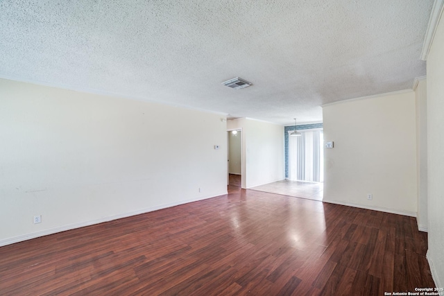 1034 Lemon Tree, San Antonio, TX 78245 - empty room with a textured ceiling and wood finished floors
