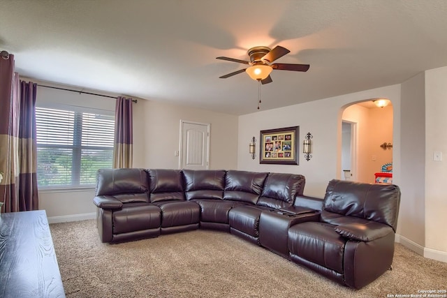 5938 Akin Song, San Antonio, TX 78261 - living area with carpet, arched walkways, and a ceiling fan