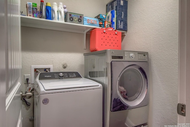 5938 Akin Song, San Antonio, TX 78261 - laundry room with independent washer and dryer and a textured wall