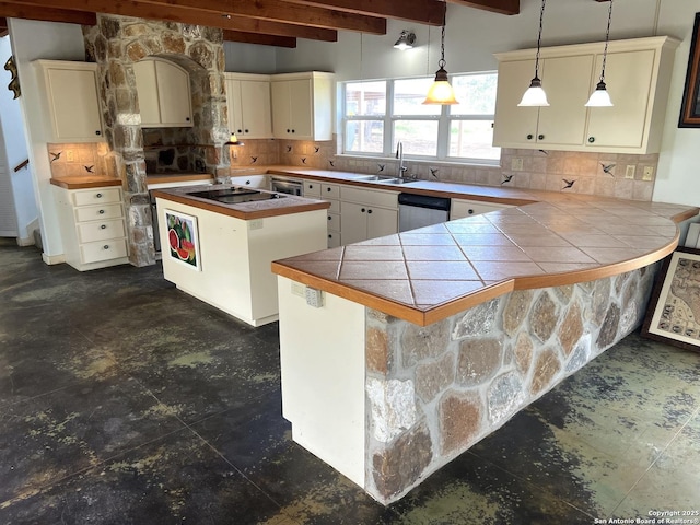 184 Guadalupe Hls, Seguin, TX 78155 - kitchen with beamed ceiling, backsplash, stainless steel dishwasher, a peninsula, and hanging light fixtures