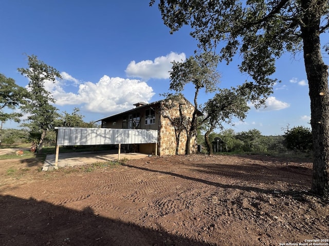 184 Guadalupe Hls, Seguin, TX 78155 - view of side of home featuring stone siding