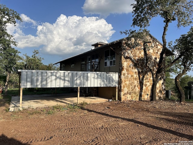 184 Guadalupe Hls, Seguin, TX 78155 - view of side of property featuring stone siding