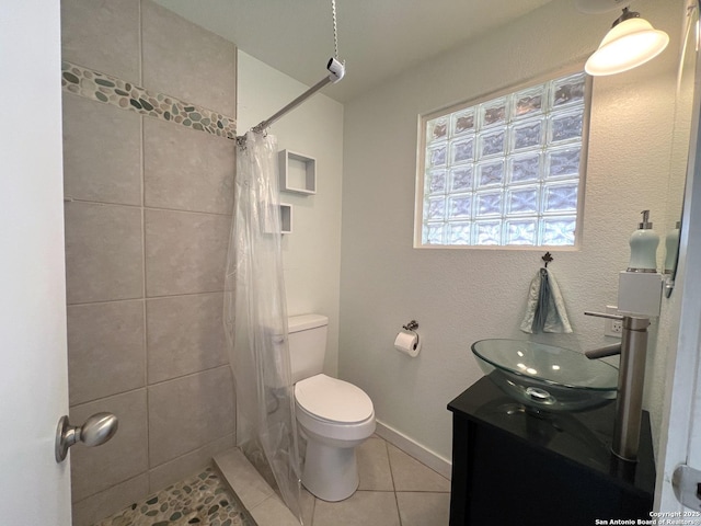 184 Guadalupe Hls, Seguin, TX 78155 - full bath with tile patterned flooring, vanity, and tiled shower