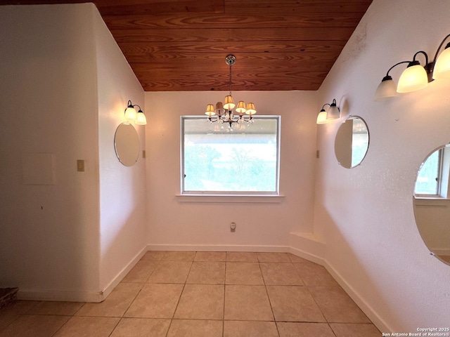 184 Guadalupe Hls, Seguin, TX 78155 - unfurnished dining area featuring wooden ceiling, a chandelier, and light tile patterned floors
