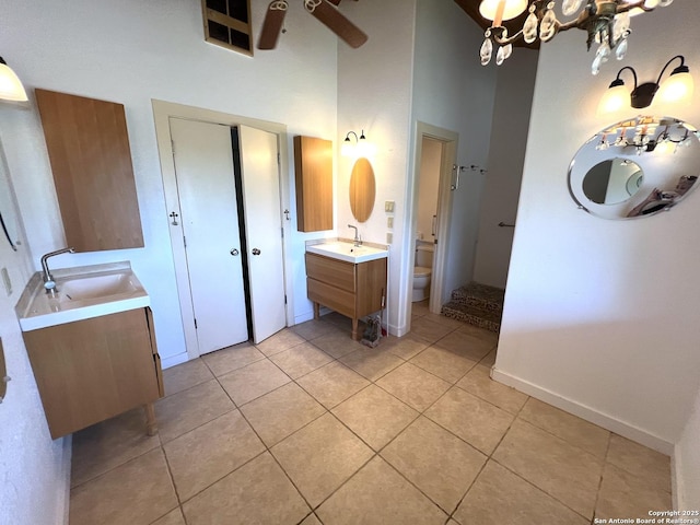 184 Guadalupe Hls, Seguin, TX 78155 - full bath with tile patterned floors, vanity, a high ceiling, and ceiling fan