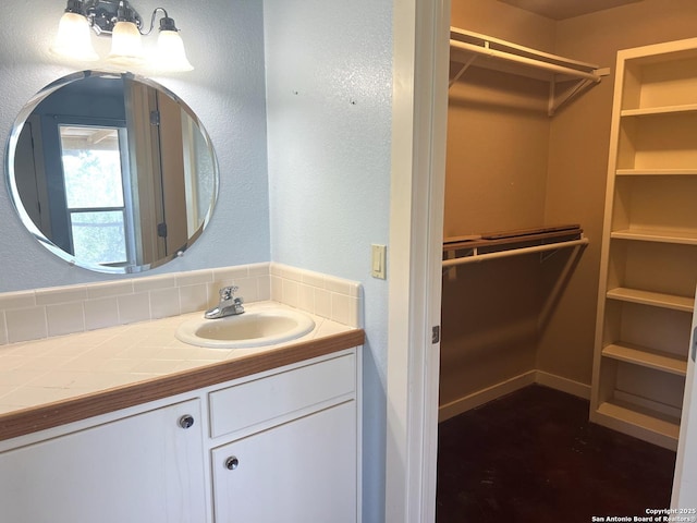 184 Guadalupe Hls, Seguin, TX 78155 - bathroom with vanity and a spacious closet