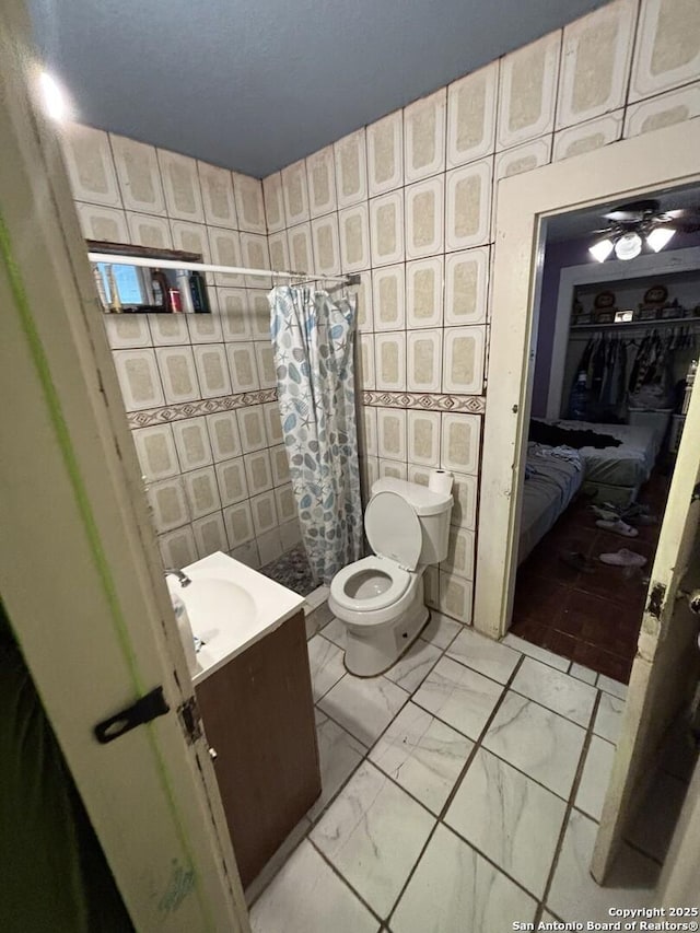 211 Wilcox, San Antonio, TX 78211 - full bath with vanity, tiled shower, and marble finish flooring