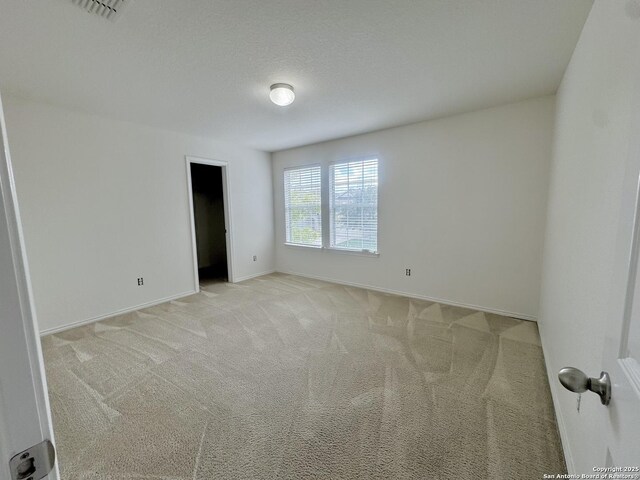130 Palazzo Torre, San Antonio, TX 78253 - unfurnished room with light carpet and baseboards