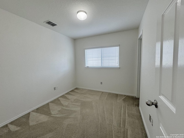 130 Palazzo Torre, San Antonio, TX 78253 - unfurnished bedroom featuring carpet floors and a textured ceiling