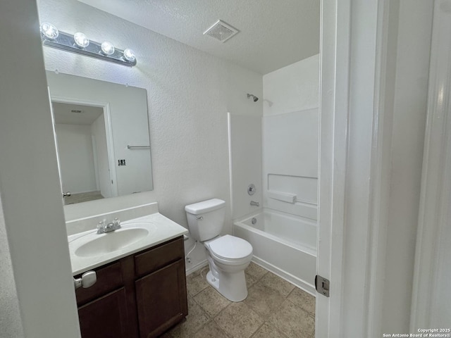 130 Palazzo Torre, San Antonio, TX 78253 - bathroom featuring vanity, bathtub / shower combination, and a textured ceiling