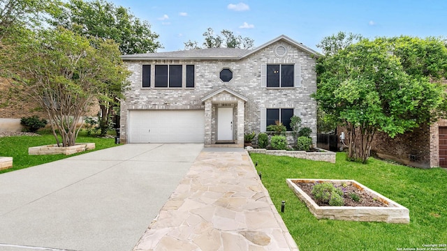 2530 Melrose Cyn, San Antonio, TX 78232 - view of front of home with a garage, driveway, a front lawn, and brick siding