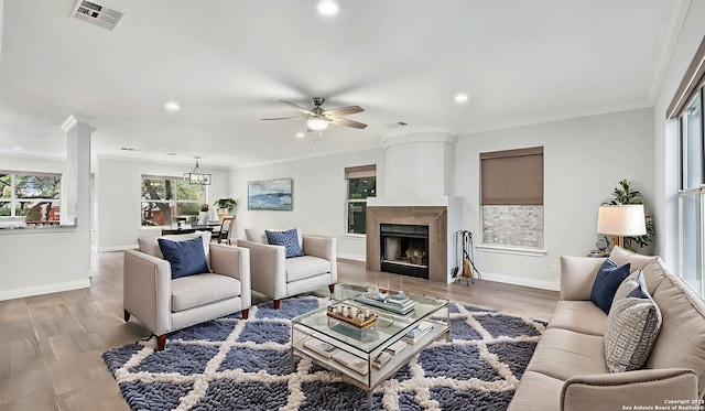2530 Melrose Cyn, San Antonio, TX 78232 - living area with a ceiling fan, recessed lighting, crown molding, a fireplace, and wood finished floors
